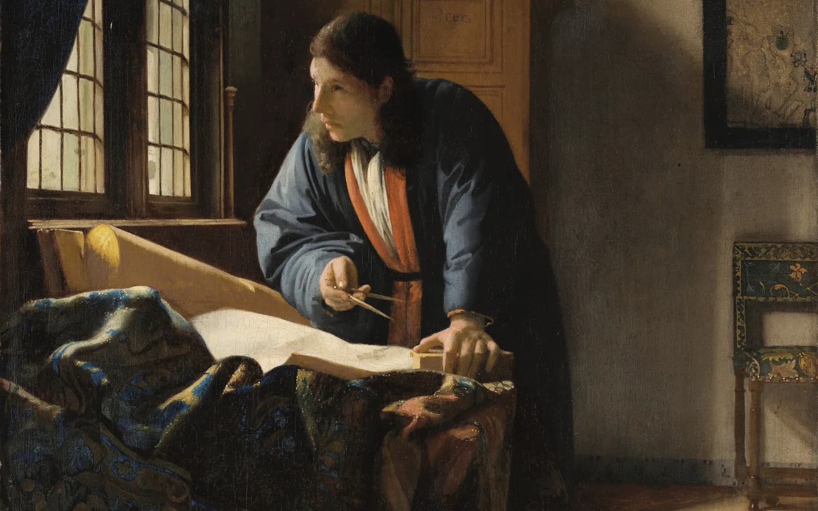 Vermeer's The Geographer: a man in a blue robe leans over a table of maps by a bright window, holding a pair of dividers and looking up in thought.