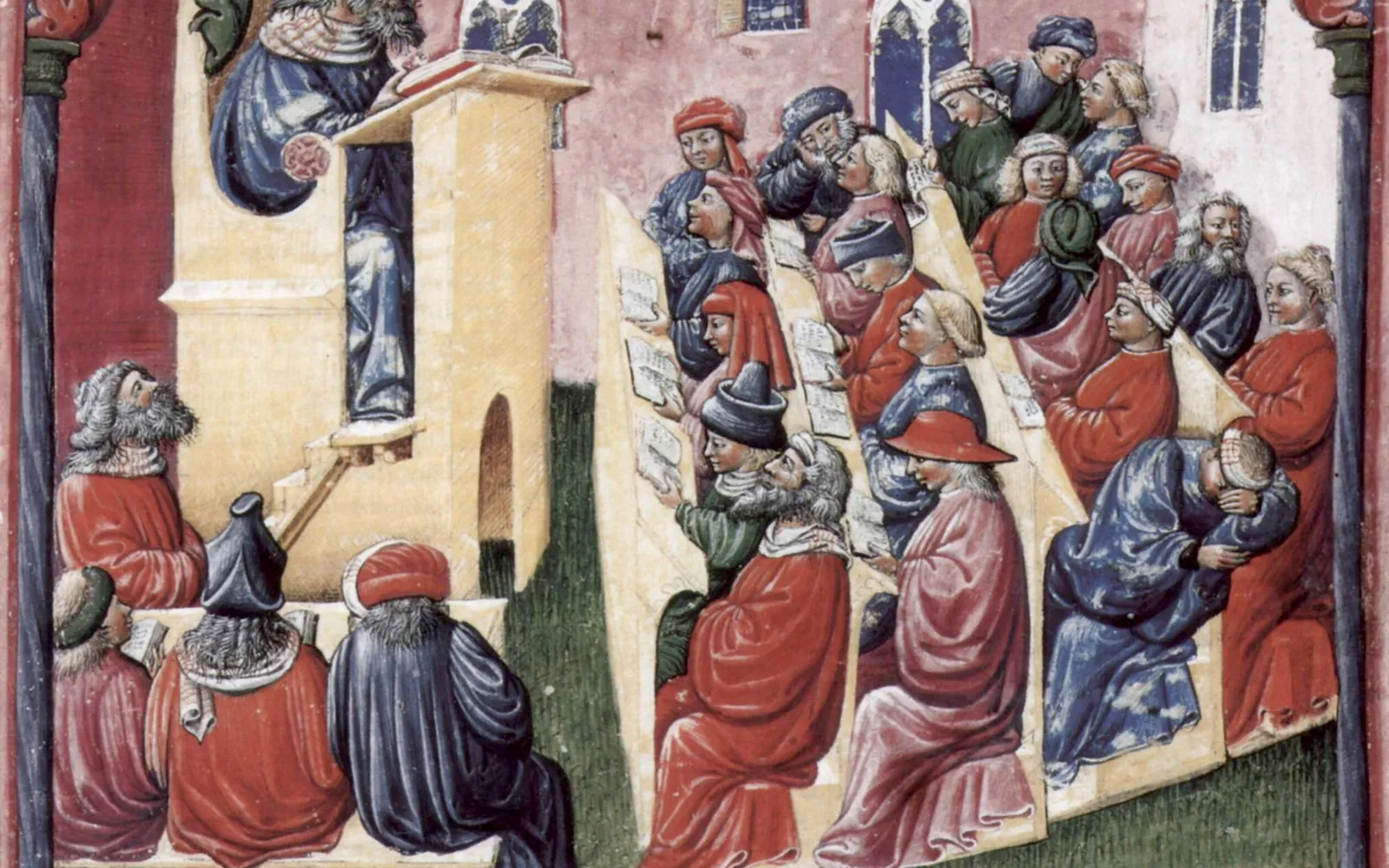 Medieval manuscript painting of a teacher lecturing from a raised lectern to rows of students in red and blue robes, some reading, some chatting, one asleep.